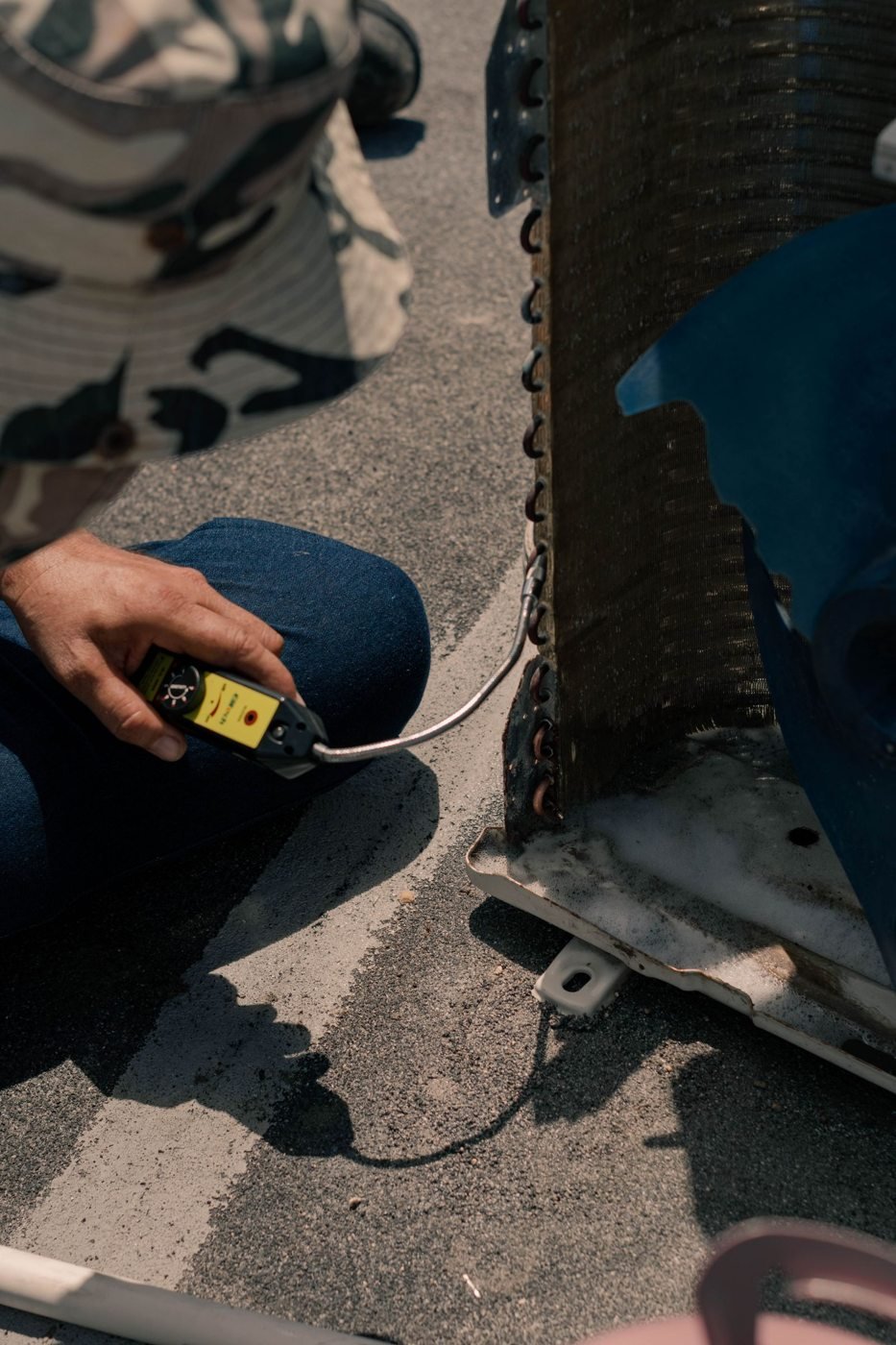 Close view of an air conditioning maintenance procedure
